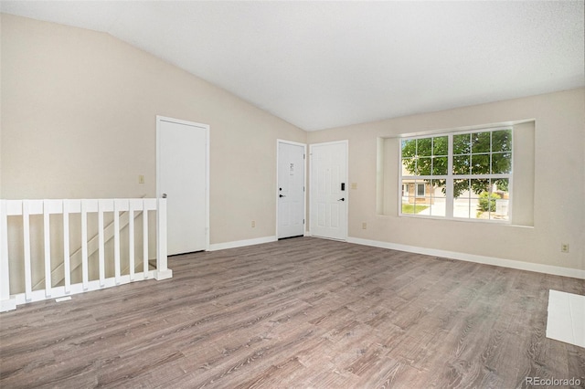 8401 Sandreed Cir, Parker, CO 80134 - foyer entrance featuring vaulted ceiling and wood finished floors