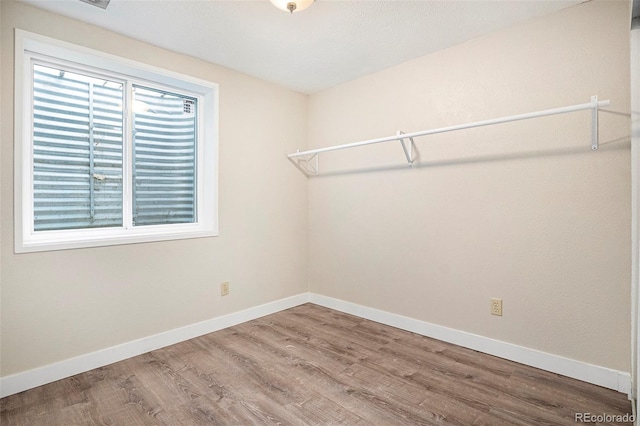 8401 Sandreed Cir, Parker, CO 80134 - walk in closet with wood finished floors
