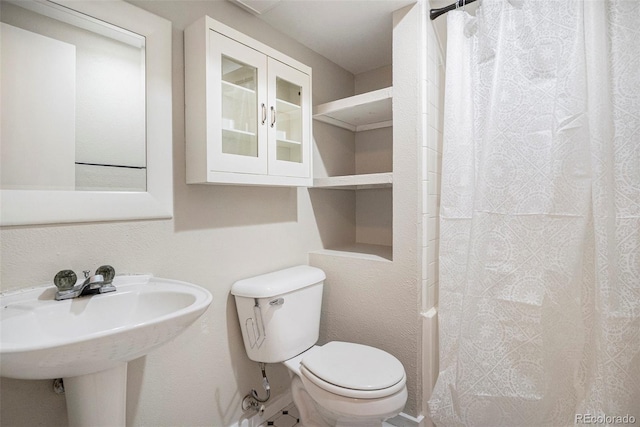 8401 Sandreed Cir, Parker, CO 80134 - bathroom with toilet and a sink