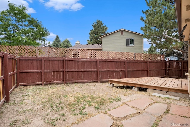 8401 Sandreed Cir, Parker, CO 80134 - fenced backyard with a wooden deck
