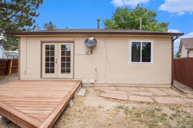 8401 Sandreed Cir, Parker, CO 80134 - rear view of property with a fenced backyard, a wooden deck, and french doors