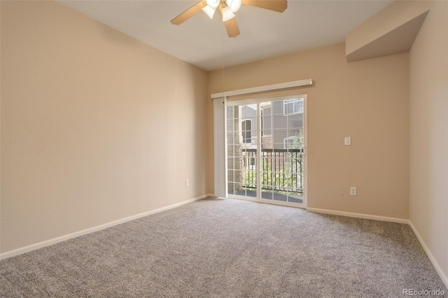 unfurnished room with ceiling fan and carpet flooring