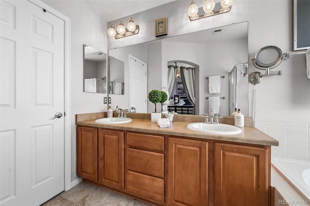 16863 Trail View Cir, Parker, CO 80134 - full bath with double vanity, a garden tub, and a shower with door