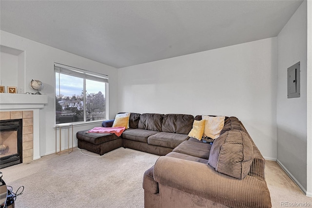 carpeted living room featuring electric panel and a fireplace