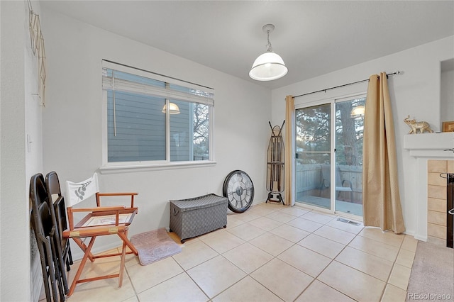 sitting room with light tile patterned floors