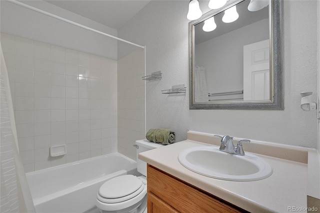 full bathroom featuring shower / tub combo, vanity, and toilet