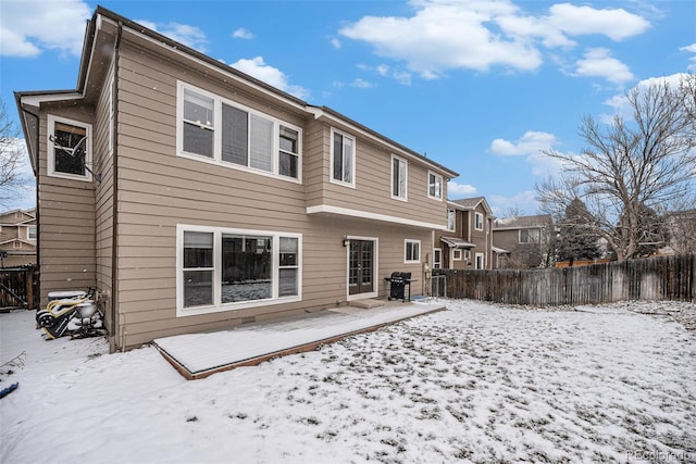 view of snow covered property