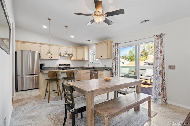 dining room with vaulted ceiling, a ceiling fan, baseboards, and recessed lighting
