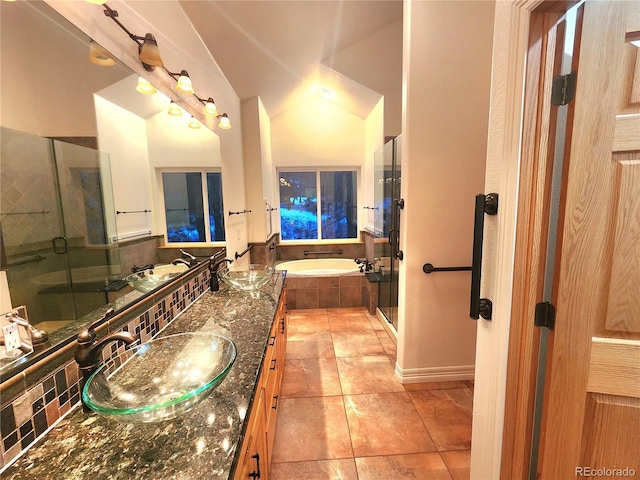 bathroom with vanity, plus walk in shower, and tile patterned flooring