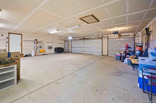 538 Sawmill Creek Rd, Evergreen, CO 80439 - garage featuring a garage door opener