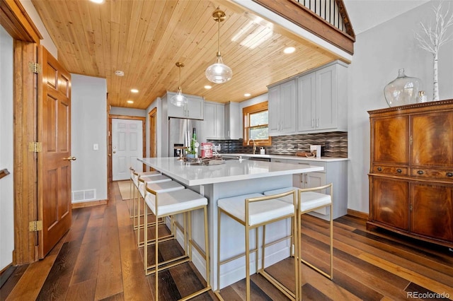 538 Sawmill Creek Rd, Evergreen, CO 80439 - kitchen with stainless steel fridge, recessed lighting, and visible vents
