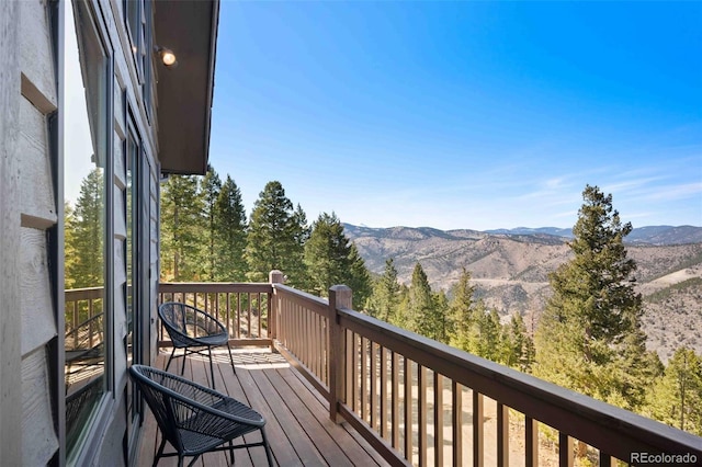 538 Sawmill Creek Rd, Evergreen, CO 80439 - wooden deck with a mountain view