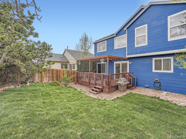 back of property featuring a wooden deck