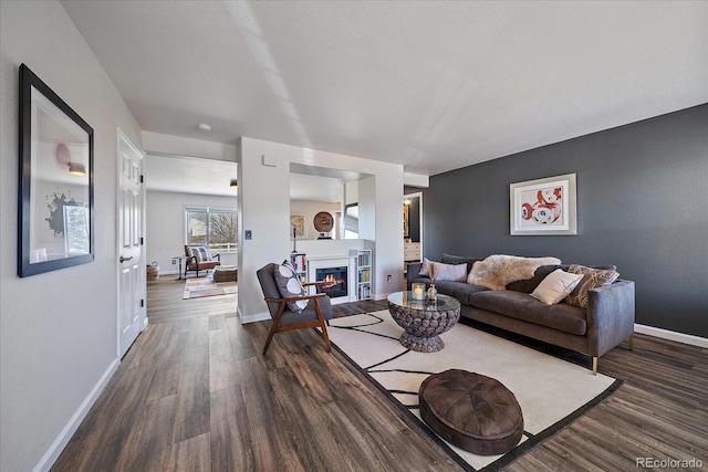 living room featuring dark wood-type flooring