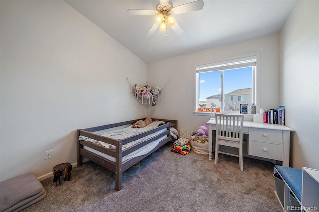 bedroom featuring ceiling fan, carpet floors, and lofted ceiling