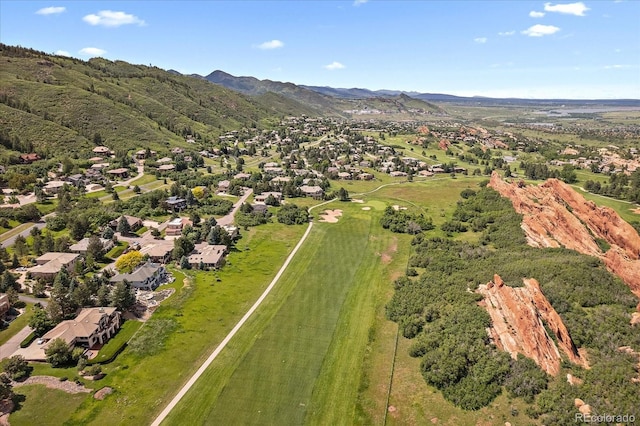 birds eye view of property featuring a mountain view