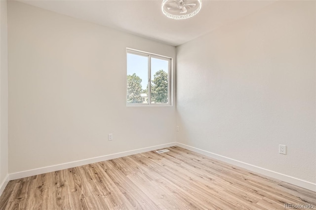 16273 E Brown Pl, Aurora, CO 80013 - spare room featuring light wood-style floors and baseboards
