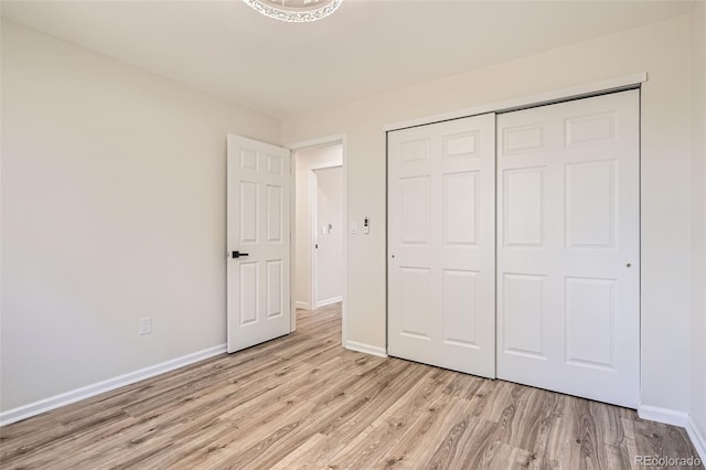 16273 E Brown Pl, Aurora, CO 80013 - unfurnished bedroom featuring light wood-style floors and a closet