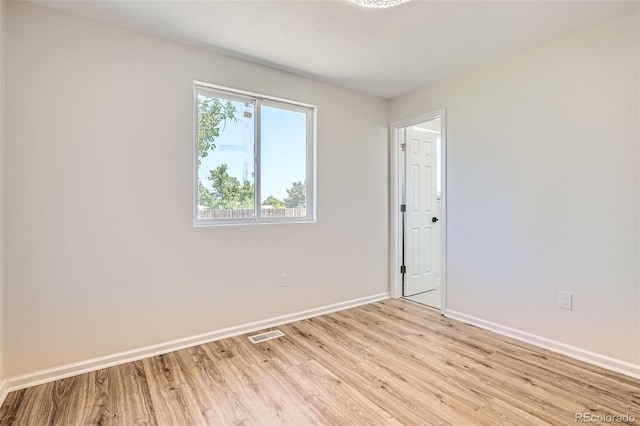 16273 E Brown Pl, Aurora, CO 80013 - spare room featuring baseboards and light wood-style floors