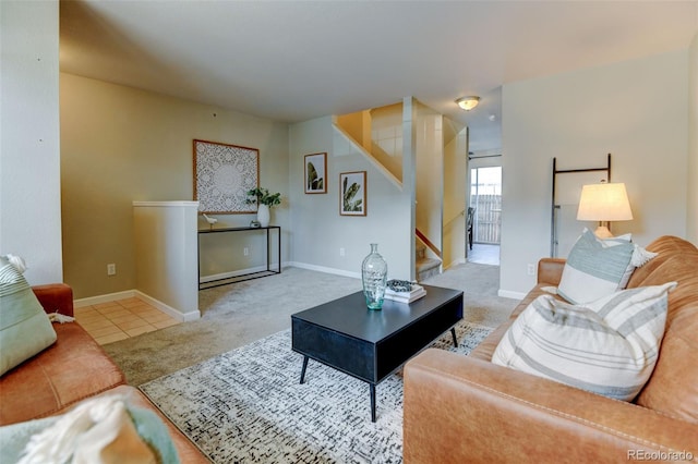 1865 Terry St Unit 3, Longmont, CO 80501 - tiled living room with baseboards, carpet flooring, and stairs