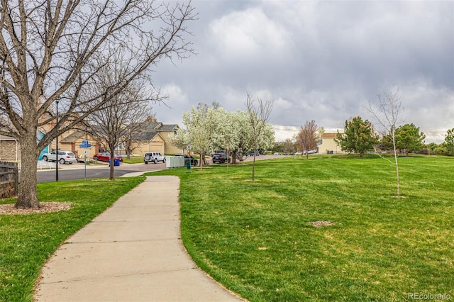 surrounding community with a yard