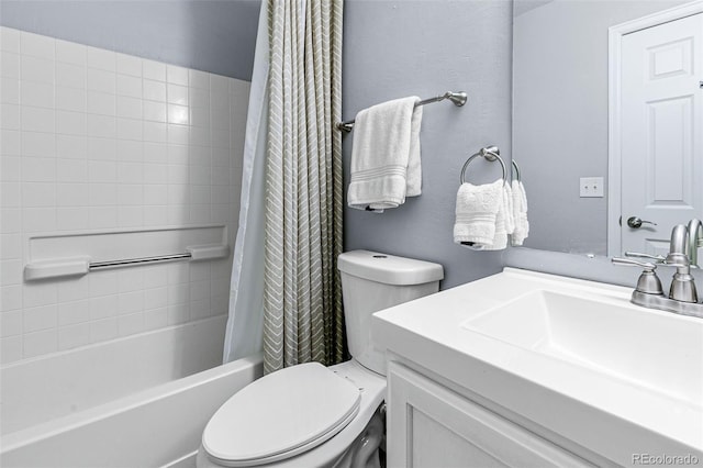 full bathroom featuring vanity, shower / tub combo, and toilet