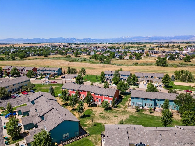 drone / aerial view featuring a mountain view