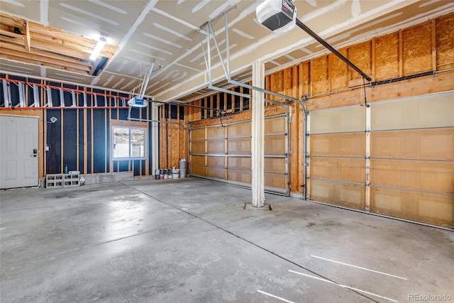 9239 Erminedale Dr, Lone Tree, CO 80124 - garage featuring a garage door opener
