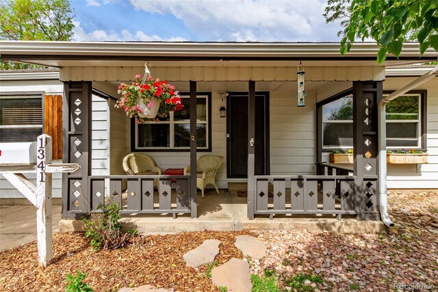 entrance to property with a porch