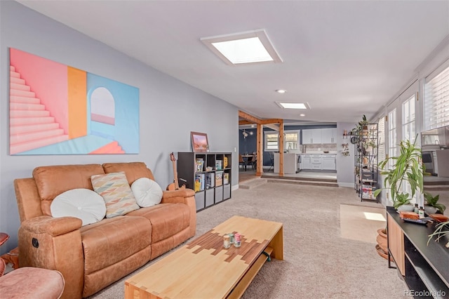 living area featuring carpet floors, recessed lighting, and baseboards