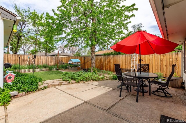 view of patio with outdoor dining area