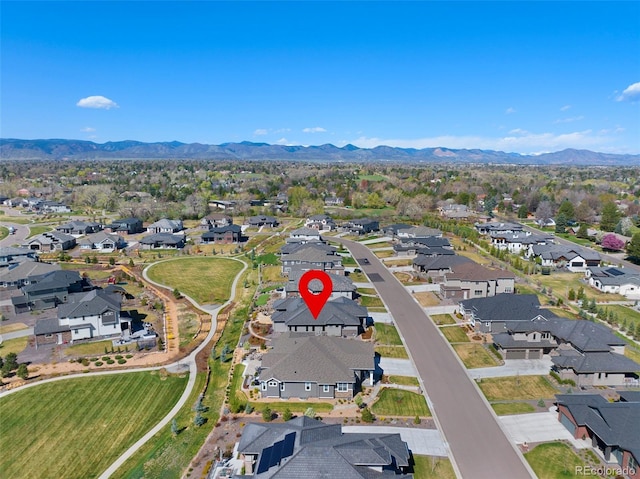 aerial view with a residential view and a mountain view