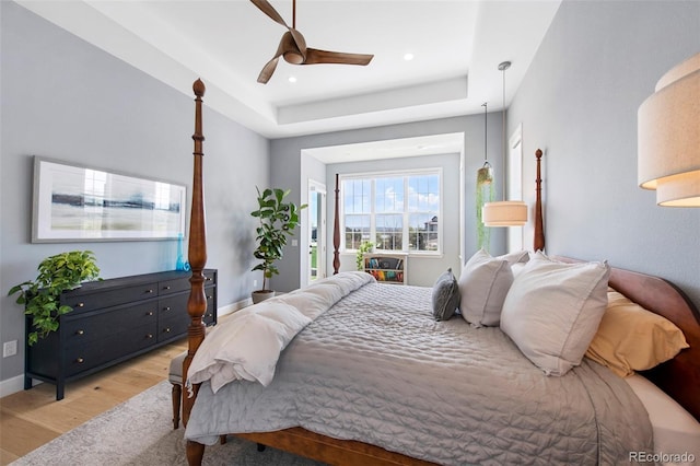 bedroom with recessed lighting, ceiling fan, baseboards, and light wood-type flooring