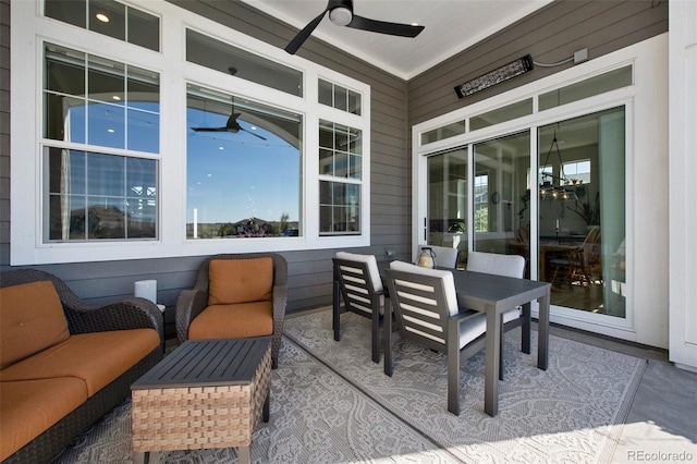 view of patio / terrace with a ceiling fan and outdoor dining space
