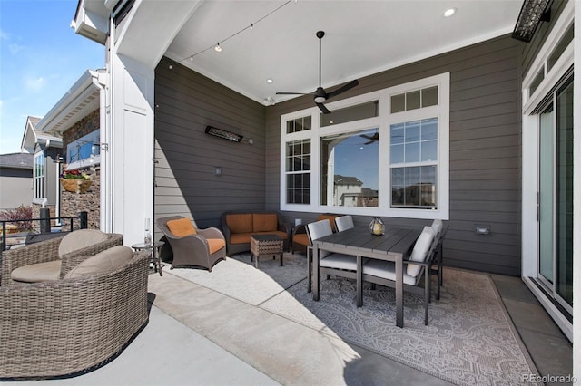 view of patio with a ceiling fan and outdoor lounge area