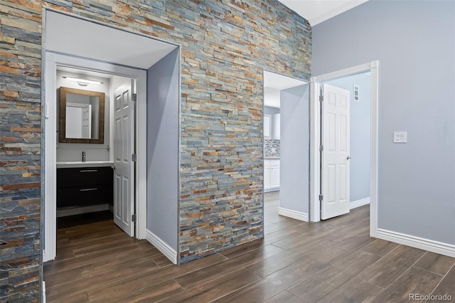 corridor featuring dark wood-type flooring