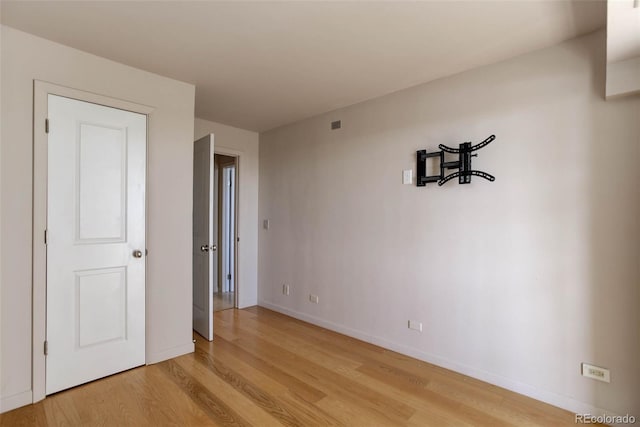 unfurnished bedroom featuring light hardwood / wood-style floors