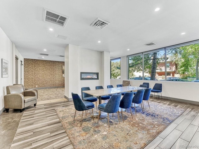 dining space featuring light hardwood / wood-style floors