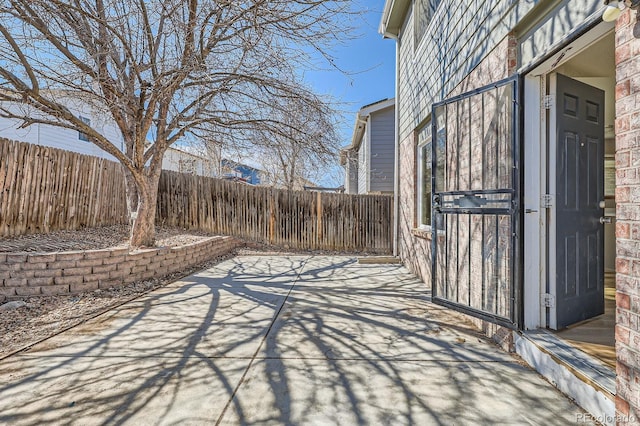 view of patio with a fenced backyard