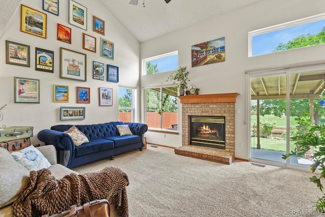 13235 Clermont Cir, Thornton, CO 80241 - living area with carpet, high vaulted ceiling, a fireplace, a ceiling fan, and a textured ceiling