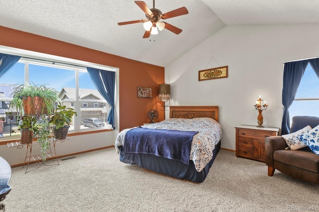 13235 Clermont Cir, Thornton, CO 80241 - carpeted bedroom featuring vaulted ceiling, multiple windows, ceiling fan, and a textured ceiling