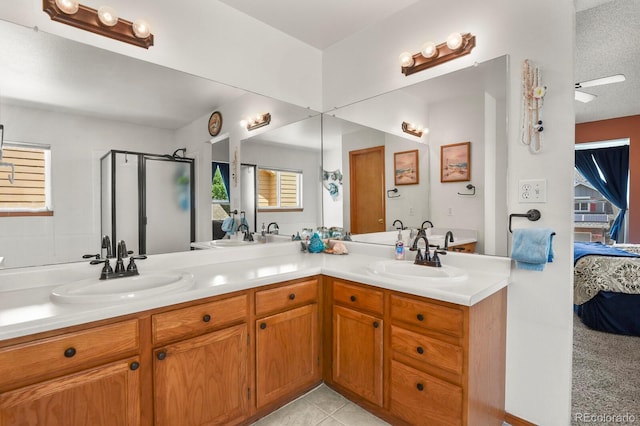 13235 Clermont Cir, Thornton, CO 80241 - ensuite bathroom featuring double vanity and a stall shower