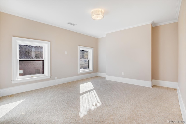 carpeted empty room with ornamental molding