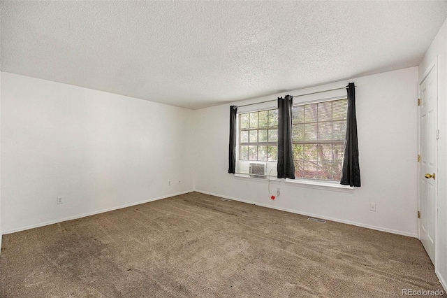 1545 S Ouray Cir Unit B, Aurora, CO 80017 - empty room with carpet floors and a textured ceiling