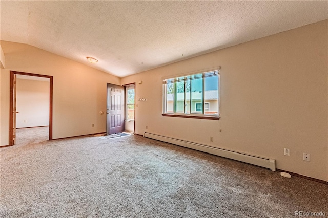 2408 N 7th St Unit A, Colorado Springs, CO 80907 - spare room with a baseboard radiator, carpet, vaulted ceiling, baseboards, and a textured ceiling