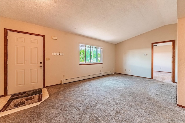 2408 N 7th St Unit A, Colorado Springs, CO 80907 - entryway featuring a baseboard radiator, carpet floors, vaulted ceiling, baseboards, and a textured ceiling