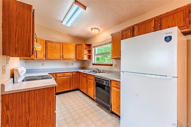 2408 N 7th St Unit A, Colorado Springs, CO 80907 - kitchen featuring freestanding refrigerator, black dishwasher, range, exhaust hood, and light floors