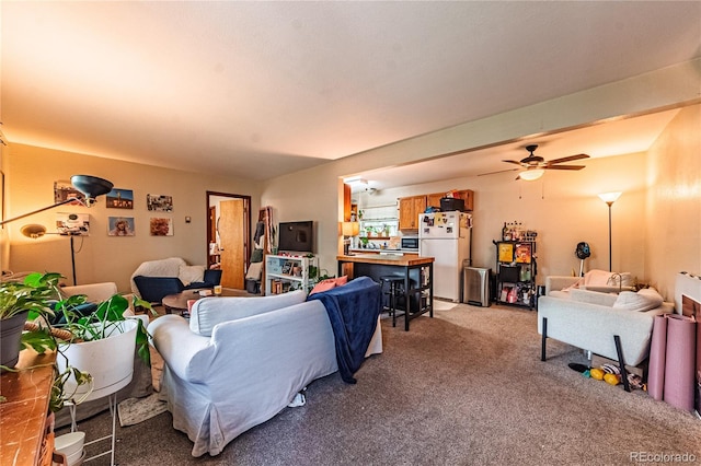 2408 N 7th St Unit A, Colorado Springs, CO 80907 - living room featuring light carpet and a ceiling fan