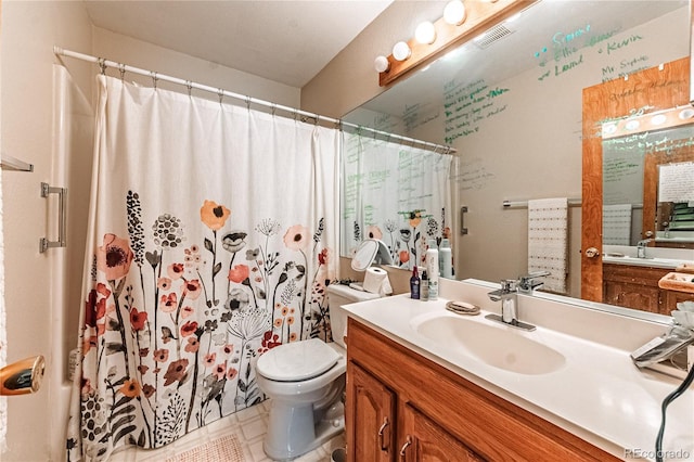 2408 N 7th St Unit A, Colorado Springs, CO 80907 - bathroom featuring toilet, vanity, a shower with shower curtain, and tile patterned floors