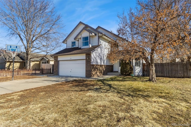 front of property featuring a garage and a front lawn